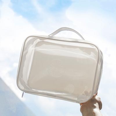 China High Quality 8 Inches Semi-Clear Handle Cosmetic Bag embossed Logo Pvc Cosmetic Pouch Large Makeup Bags For Toiletry for sale