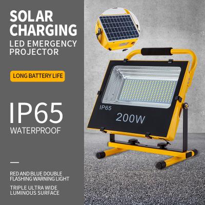 China Portable Solar Led Flood Lights 100w Emergency High Bright Light With Charging for sale