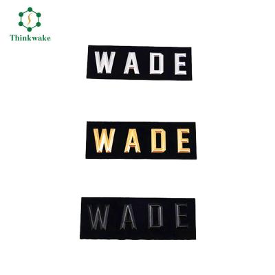 China Wholesale Washable Heat Transfer Iron On Clothes Handbag 3d Raised Effect Brand Logo Silicone Patches OEM Logo Label for sale