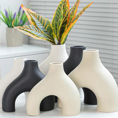 China Contemporary Nordic irregular white ceramic vase decoration indoor flower vase for living room for sale