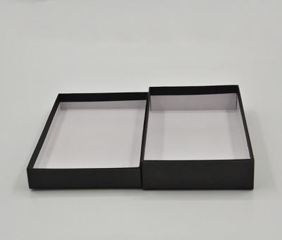 China Custom Printed Top And Bottom Lid Style Clothing Garment Black Rigid Cardboard Packaging Gift Box for sale