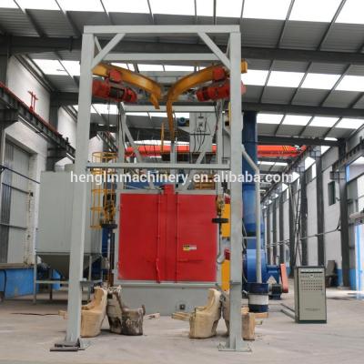 China metal surface cleaning double hook shot blasting machine/big fish machine for sale