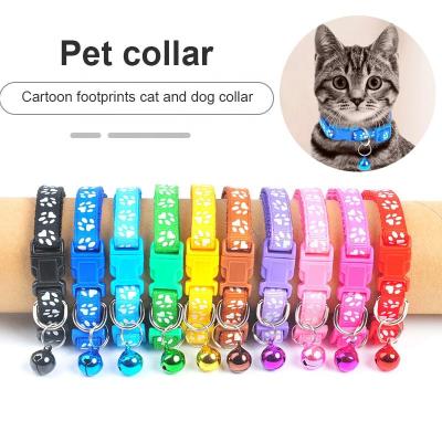 China Pet Stocked Collar for Cats Collar for Cats Collar with Cute Bell Collar Paw Print Adjustable Nylon Ribbon Neck Strap for sale