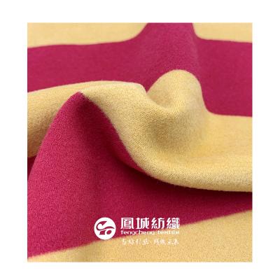 China Anti Pill Australian Fleece Double Faced Fabric Double Faced Warm Acrylic Velvet Fabric Fabric With Yarn Dyed Stripe for sale