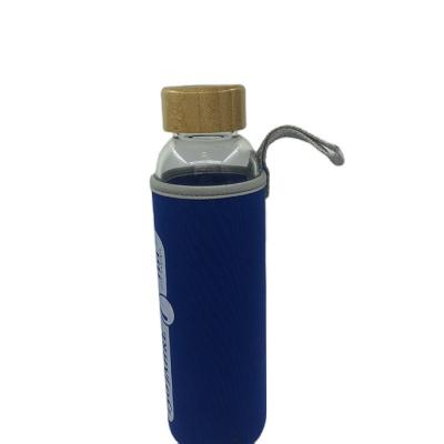 China High Quality Sustainable Borosilicate 550ml Bamboo Lid Glass Water Bottle With Neoprene Sleeve for sale