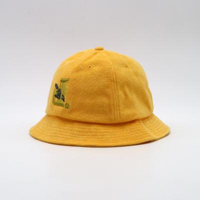 China Sombrero amarillo de la pesca del algodón del bordado del sombrero unisex plano del cubo en venta