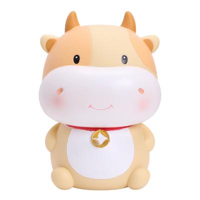 China Children's toy piggy bank of coin storage box baby coin savings box creative cute cow to small gift for sale