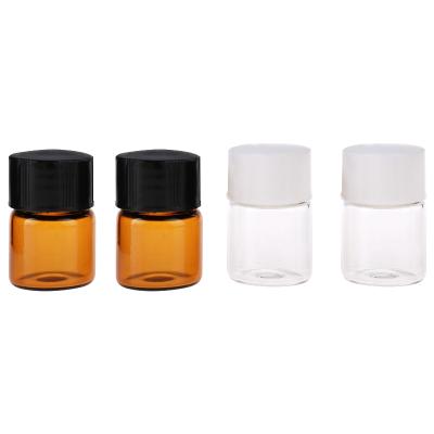 China Essential Oil Cosmetic Bottles Empty 1ml Amber Glass Vials Mini Sample Bottle with Orifice Reducers and Black Caps for sale