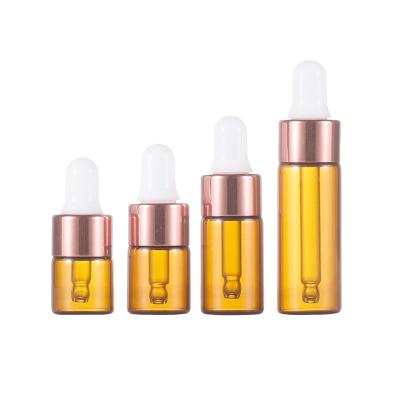 China Amber Glass Vials Mini Sample Cosmetic Bottle 1ml 2ml 3ml 5ml Empty Essential Oil Bottles With Eye Dropper for sale