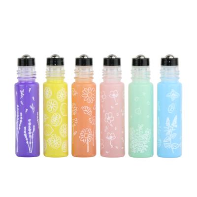 China 10ml Cosmetic Glass Roll On Bottles Flower Printed Travel Empty Vial Cosmetic Roll On Bottles With Stainless Steel Roller Balls for sale