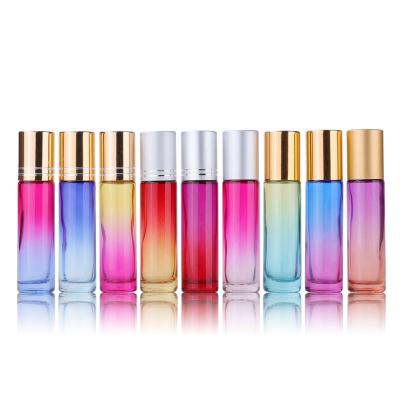 China 10ml Cosmetic Glass Roll On Colored Sample Vial Perfume Bottle Stainless Steel Ball Essential Oil Roll Bottle With Gold Lids for sale