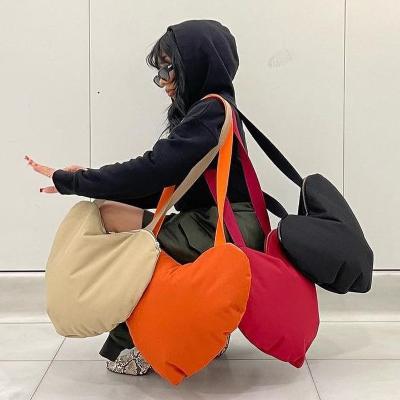 China Polyester New Arrivals Women Bags 2022 Solid Color Trending Hearts Shape Women's Messenger Bags Casual Large Capacity Woman's Shoulder Bag for sale