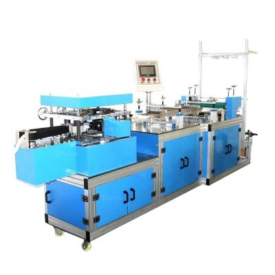 China Disposable Non Woven Surgical Head Cap Making Machine with 5600mm *900mm * 1650mm Size for sale