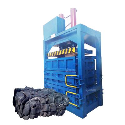 China Vertical Waste Paper Plastic Film Baler with Recycling System and 600 KG Capacity for sale