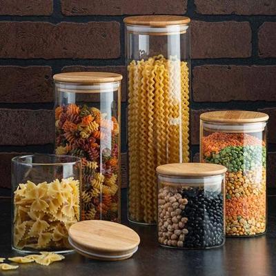 China Classic Wholesale Newlnnovations Kitchen Corrosion Resistance Borosilicate Airtight Glass Jar With Bamboo Lid And Silicone Ring for sale