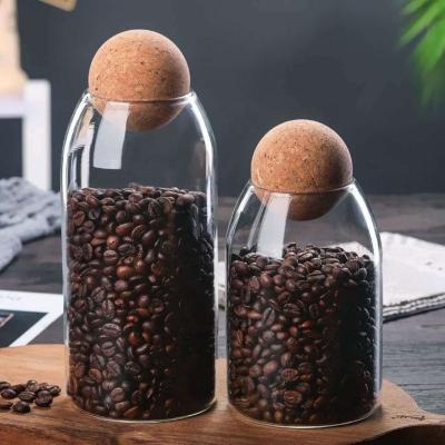 China Household Products Coffee Bean Glass Jar With Spherical Cork Lid for sale