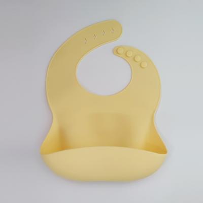 China Custom Printed Silicone Feeding Bib Cute Cartoon Design Food Catcher Bib for sale