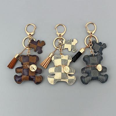 China China New Faux Cute Bear Tassel Key Ring Keychain Mini Bag Charm Leather Keychain for sale