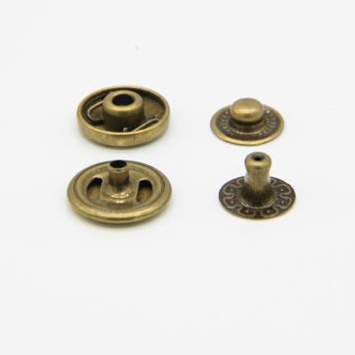 China Custom press color metal snap four part gold plated button factory direct sale nickel free for coats for sale