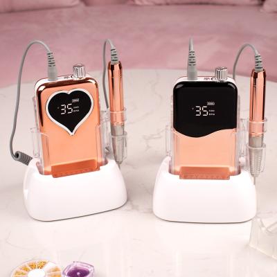 China Misbeauty Rechargeable Cordless E-File Heart Shape Brushless Gold Manicure Nail Exerciser Machine 35000rpm Rechargeable Customize Private Logo for sale