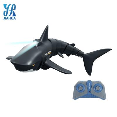 China Waterproof 2.4G Shark Racing Shark Boat Toy Electric Remote Control RC Boats Eco-friendly Material for sale