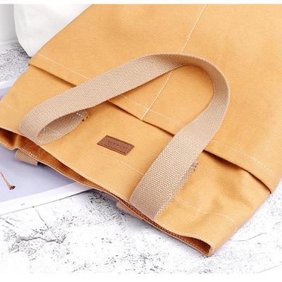 China Fashion DOOR Japanese style wash canvas bag canvas shoulder bag male and female style messenger bag large capacity for sale