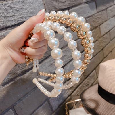 China Instagram Hot News Fashionable Material Friendly Design Women Large Pearl Head Band Hair Accessories Grace Head Bands for sale