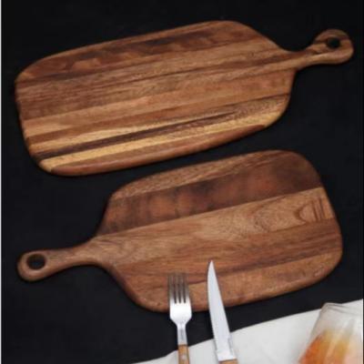 China Sustainable Wholesale Amazon Walnut Wooden Pizza Board for sale