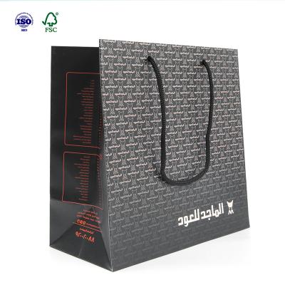 China Custom Design Recyclable Luxury Black Paper Bag Shopping Logo For Boutique for sale