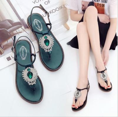 China New Summer Anti-slippery Women's Wild Amason Flat Flat With Roman Bohemian Open Toe Clip Beach Sandals for sale