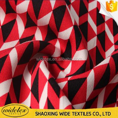 China Cheap Rayon Fabric Plain WIDETEX Textiles Red Color Woven Printed Skirt Material for sale