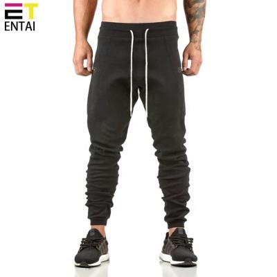 China 2020 New QUICK DRY Trending Men's Casual Pants With Drawstrings Waist Fitness Joggers Elastic Men's Sports Tracksuit for sale