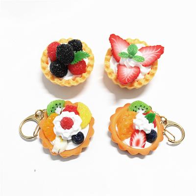 China Novelty Global Christmas Gift Fake Fruit Plastic 3D Cake Key Chain for sale