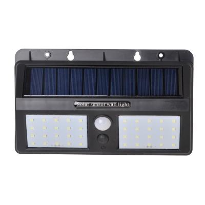 China Garden Landscape 20w Lamp Motion Mount Sensor Led Outdoor Solar Wall Light for sale