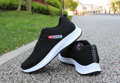 China Light Sports Breathable Knitted Causal Running Shoes For Men Jogar Shoes for sale