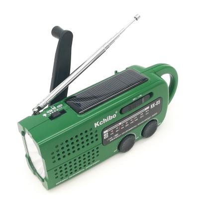 China Kchibo Solar Panel Operated Portable Radio Outdoor FM AM Emergency Survival Package Hand Winding Flashlight Solar Crank Radio for sale