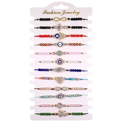 China Factory New 12 Piece Set Durable Crystal Beaded Braided Rope Boho Charm Evil Eye Adjustable Bracelet for sale