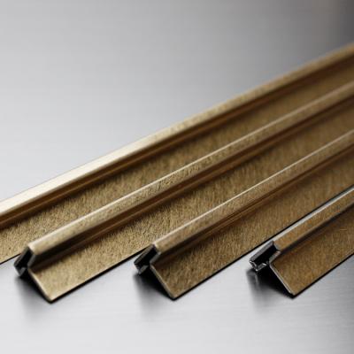 China Modern Decorative Tile Accessories 304 Stainless Steel Tile Strip Vibration Gold SS T Profile for sale