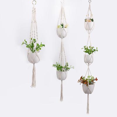 China 100% DIY INS Handmade Cotton Rope Hangings Indoor and Outdoor Basket Net Flowerpot Basket Hanging Hanging Baskets for sale