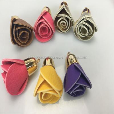 China Wholesale Running Beauty Zhenbo Flower Bones Bulk PU Leather Tassel Key Chain for sale