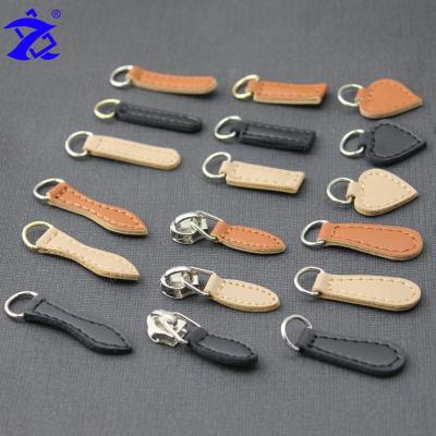 China YIWU ZHEBO Logo Design PU Zipper Slider Nickel Free Custom Leather Puller for sale