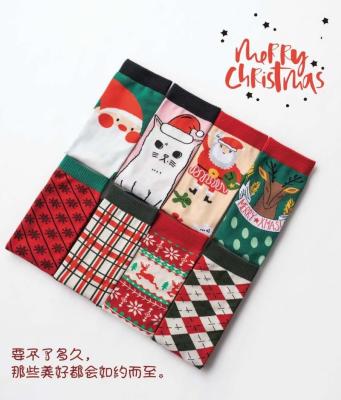 China The new viable Christmas gift bumps left and right stitching Japanese style creative retro boneless head asymmetrical ab socks feet tre for sale