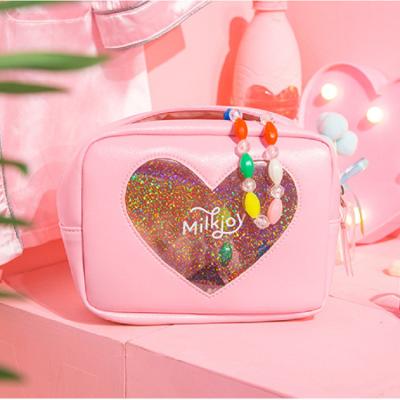 China Fashion Christmas Gift Diamond Love Cosmetic Bag Laser Heart Transparent Travel Makeup Bags for sale