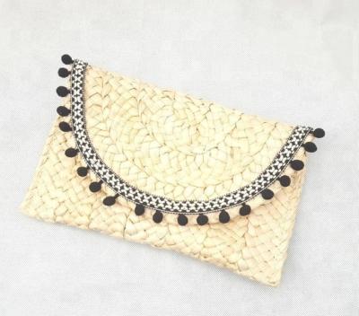 China Fashion Lady's Straw Woven Pompom Clutch/Purse, Women's Straw Wrap Clutch with Black Pompom for sale