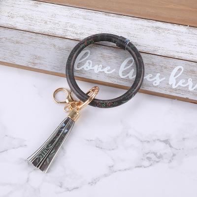 China Style PU Chain Bracelet Leopard Leather Keychain Keychain Exaggerated Round Designer Key Keychain Wooden Bead Wrist Strap Wholesale for sale