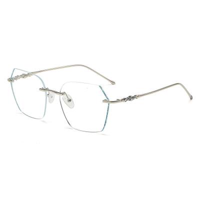 China 8275 Custom Metal Rimless Eyeglasses Anti-blue Light Weight Frameless Eyewear Women Shape Frameless Optical Eye Glasses for sale