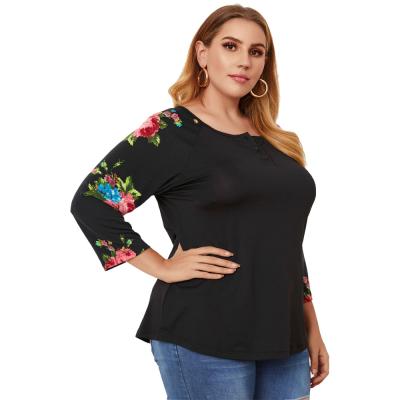 China Floral Curved Anti Shrink Raglan Sleeve Tunics Women Edge Tees Plus Size Tops for sale