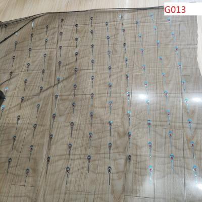 China Shrink-Resistant Glue Sequin On 100% Polyester Mesh For Woman And Girls Dress for sale