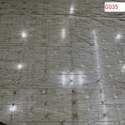 China Shrink-Resistant Glue Sequin On 100% Polyester Mesh For Woman And Girls Dress for sale