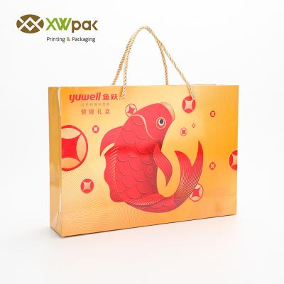 China Recyclable kraft paper bag with twisted handle reusable shopping paper bags logo printed for sale